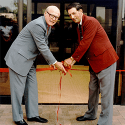 Ribbon-cutting ceremony on April 2, 1984, for new Farm Credit Building in McLean.  Pictured left to right: FCA Governor Donald Wilkinson and  Dwight L. Tripp, chairman of the Federal Farm Credit Board. 
