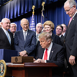 President Trump signs the Agriculture Improvement Act of 2018 on Dec. 20, 2018.